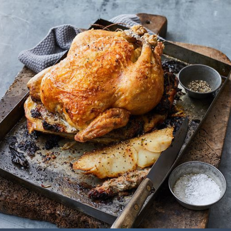 Roast chicken with sausage and prune stuffing on a bed of sourdough & potatoes (1.5kg)